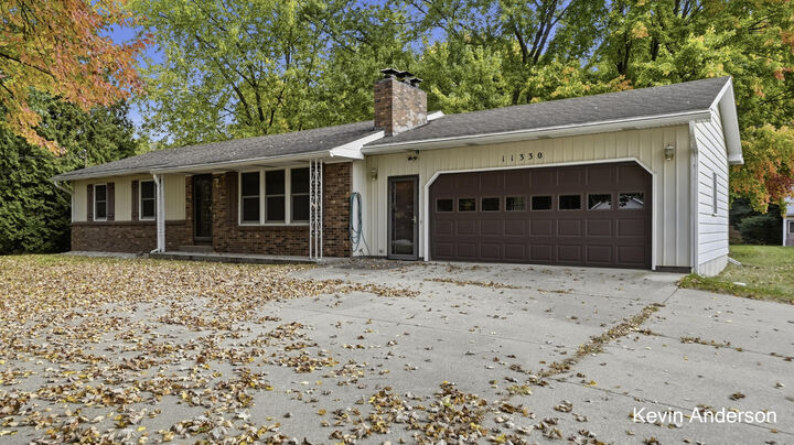 Property Photo:  11330 Wabasis Avenue NE  MI 49341 