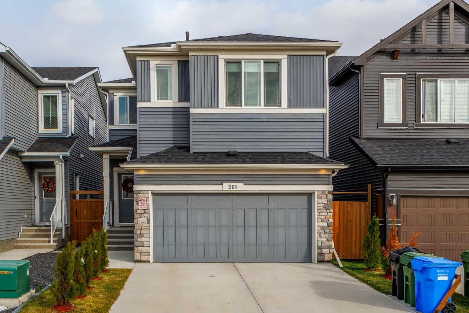 Property Photo:  201 Creekstone Path SW  AB T2X 4Z4 