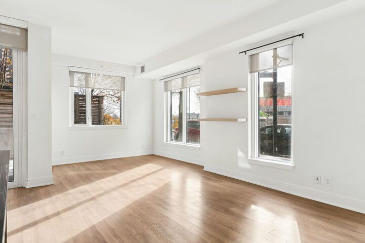 Property Photo:  619 Confluence Way SE 124  AB T2G 0G1 