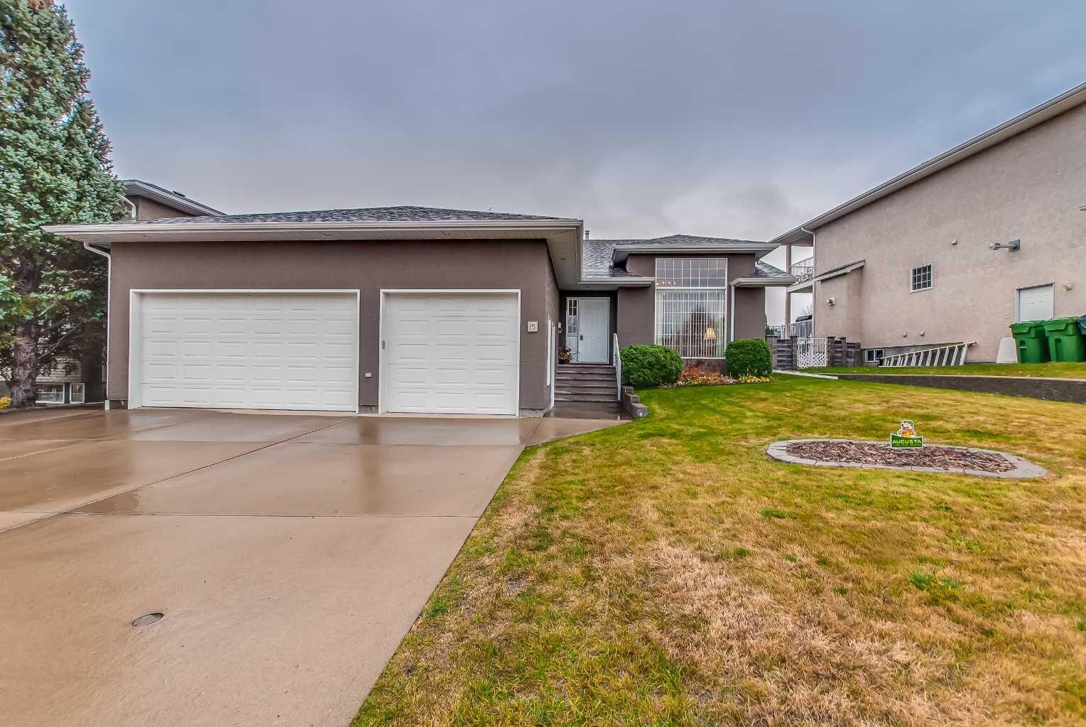 Property Photo:  15 Parish Way NE  AB T1C 1X1 