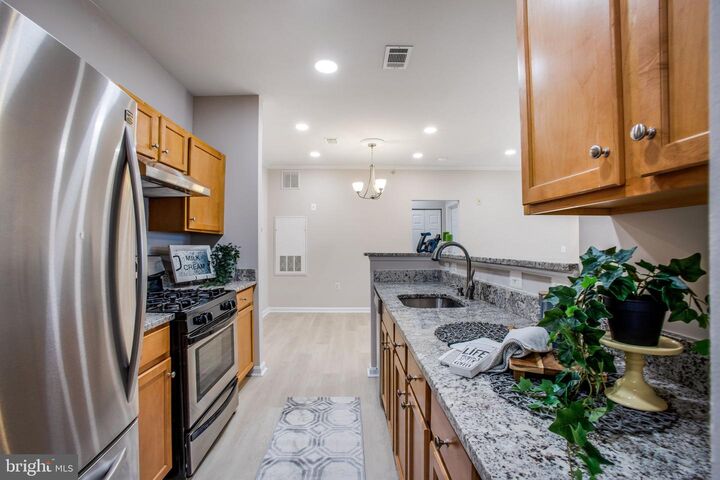 Property Photo:  13359 Connor Drive J  VA 20120 