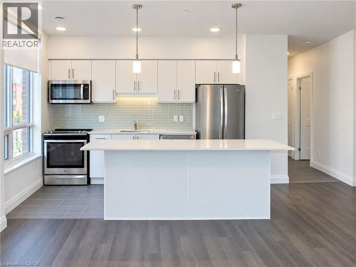 Property Photo:  399 Queen Street South 212  ON N2M 1A3 