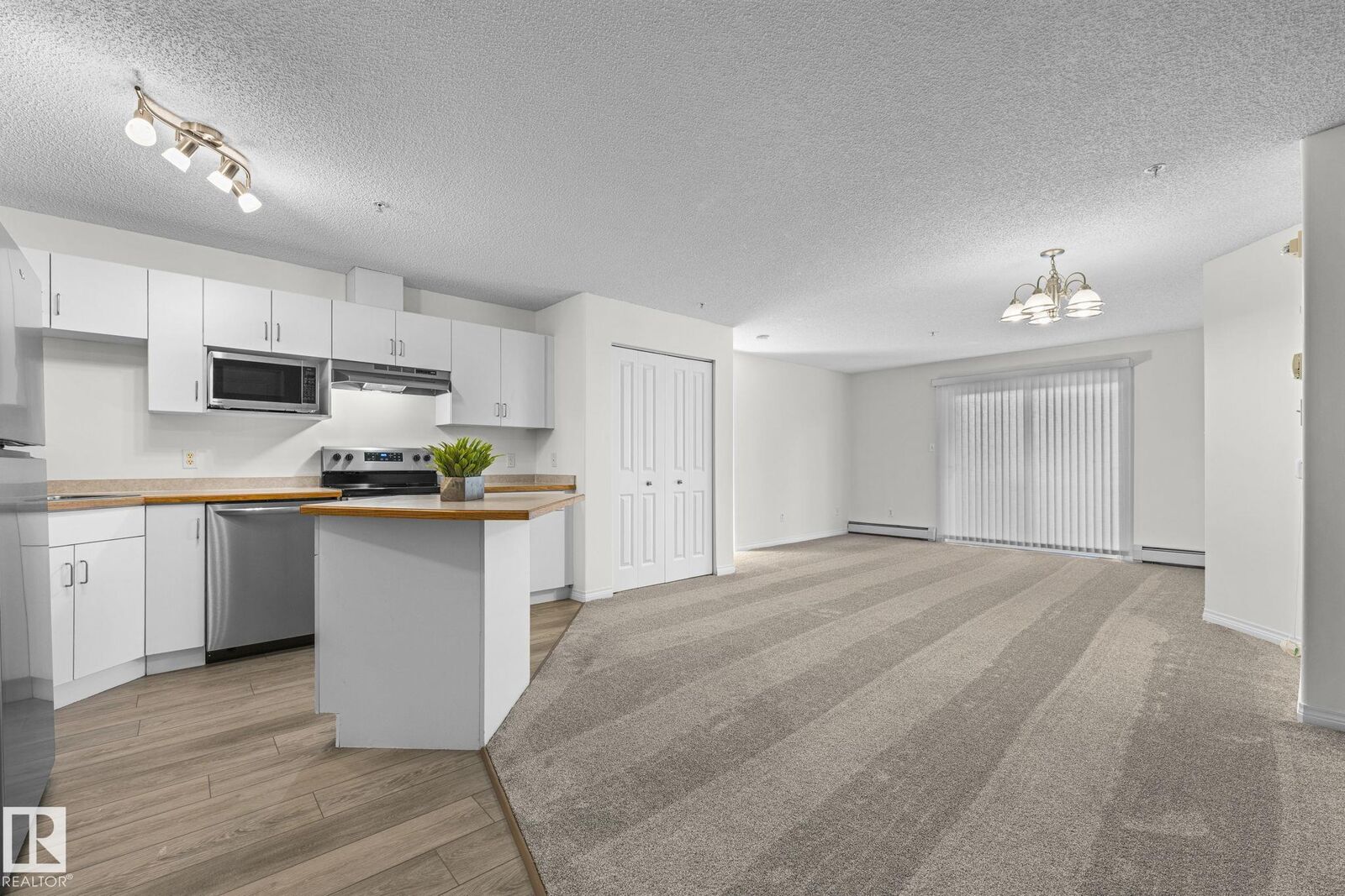 Property Photo:  11325 83 Street NW 211  AB T5B 4W5 