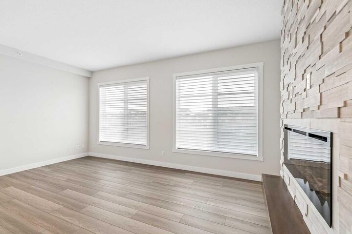 Property Photo:  2117 81 Street SW 2402  AB T3H 6H5 