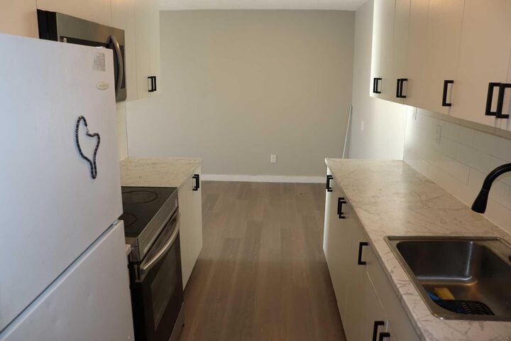 Property Photo:  5611 9 Avenue 201B  AB T7E 1R5 