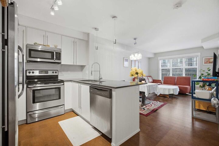 Property Photo:  11 Mahogany Row SE 3401  AB T3M 2L6 