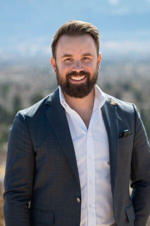 Andrew Perkett,  in Colorado Springs, Kenney & Company