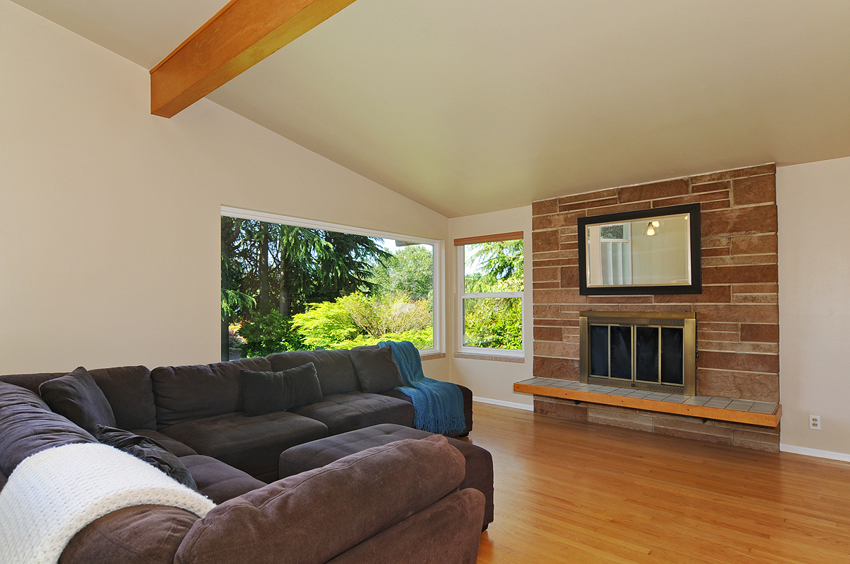 Property Photo: Living room, dining room, kitchen 242 S 173rd Place WA 98148