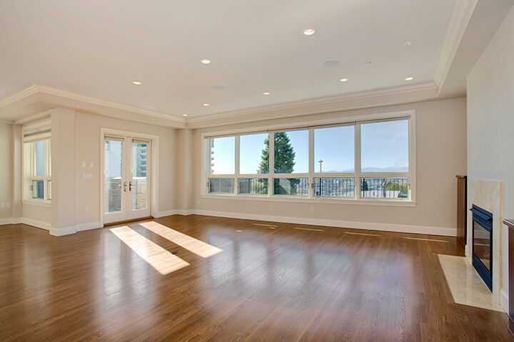 Property Photo: Elegant living and dining room with fireplace 716 Boylston Ave E 12 WA 98102