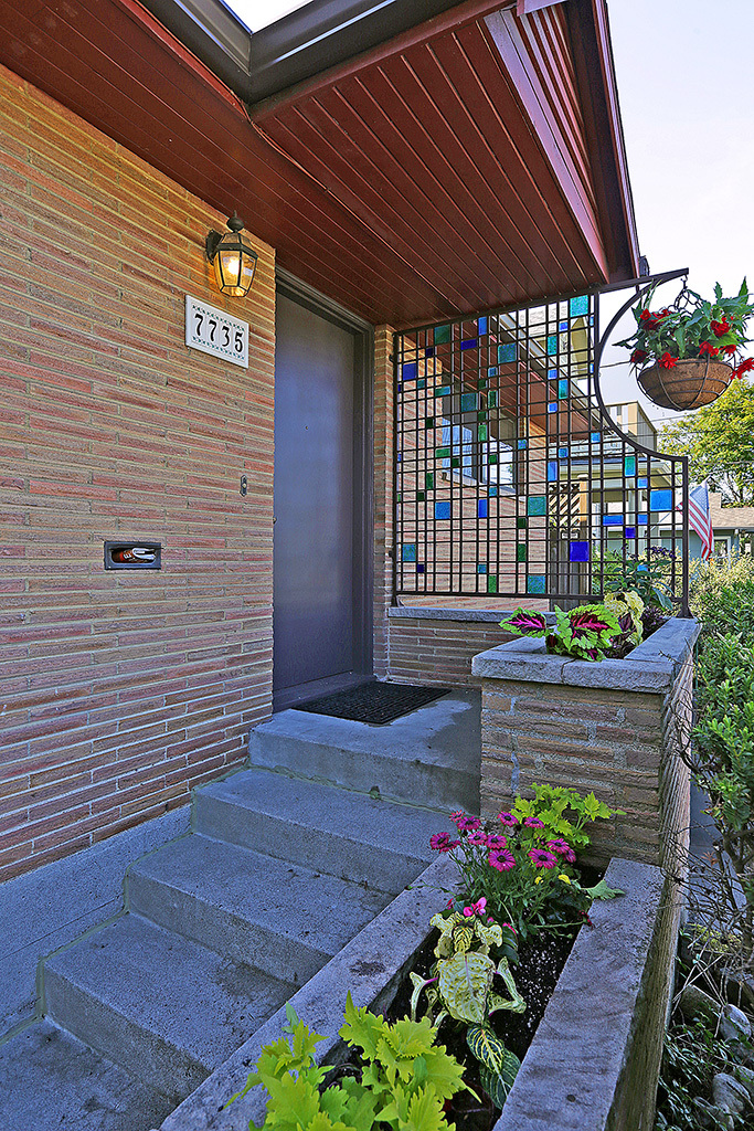 Property Photo: Brick mid-century 7735 27th Ave NW  WA 98117 