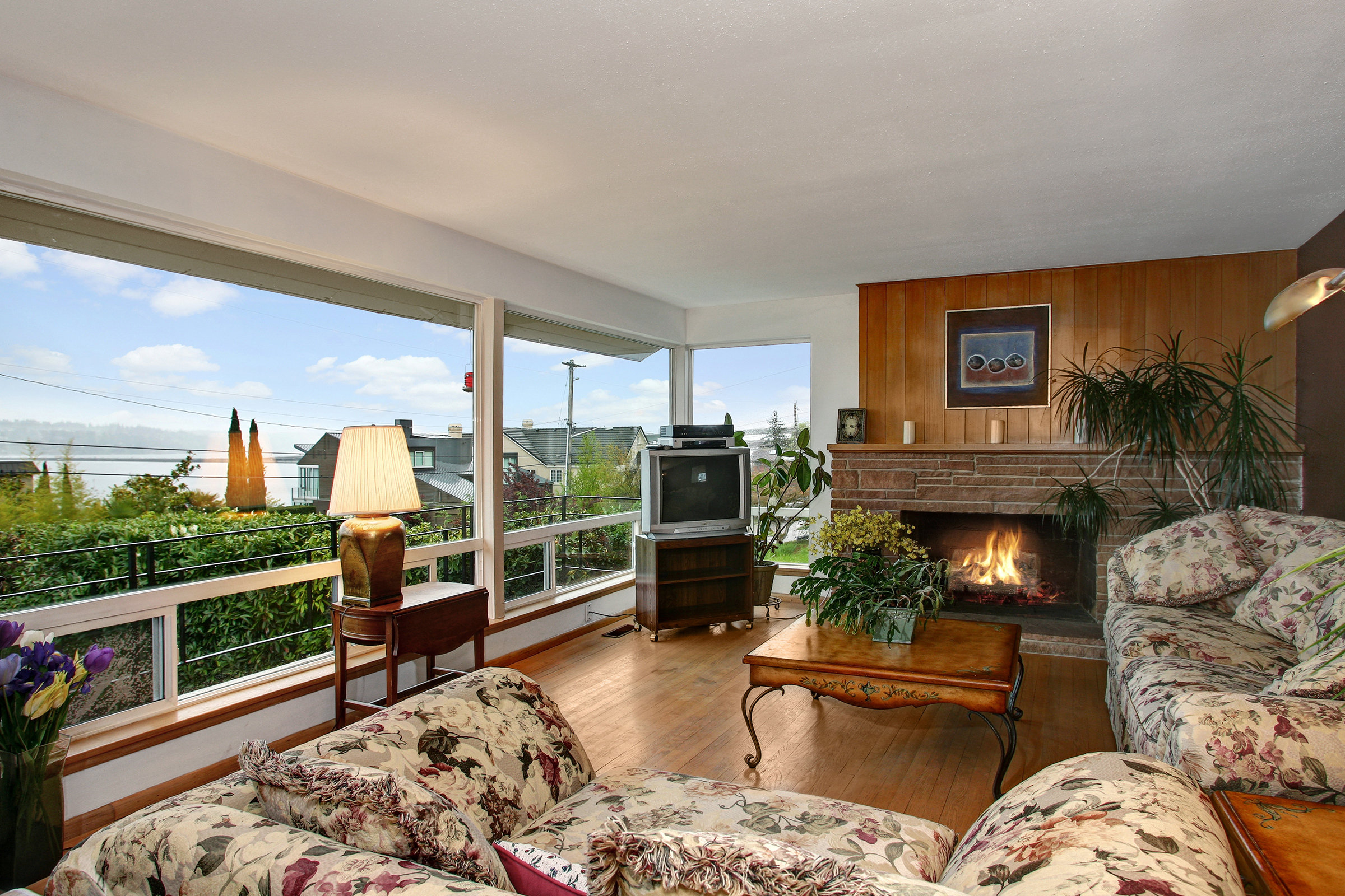 Property Photo: Living room with expansive views 827 Lakeside Ave S  WA 98144 