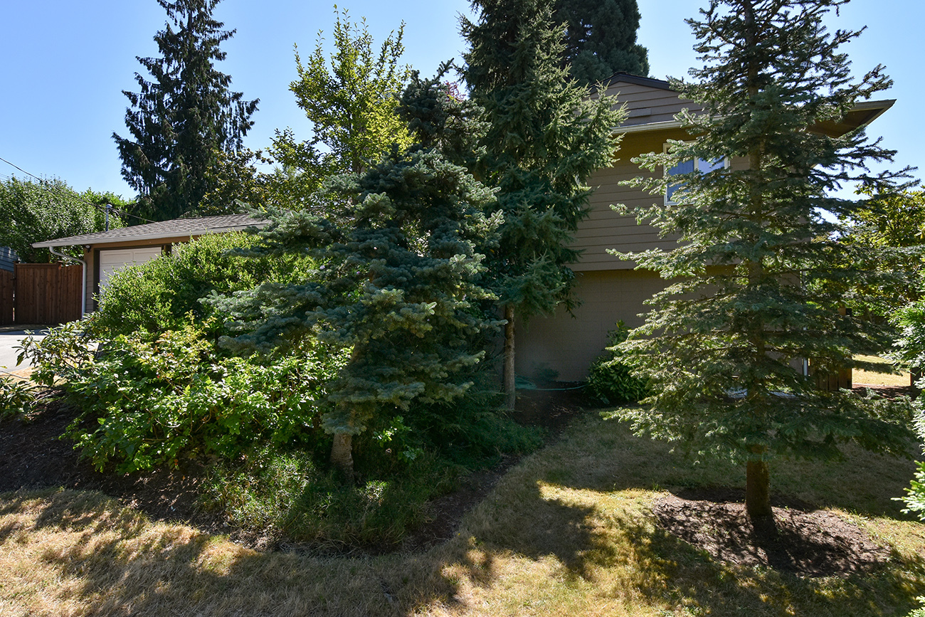 Property Photo: Exterior Front 15221 SE 2nd Place  WA 98007 